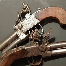 Pair double-barrelled flintlock pocket pistols by Adams, London